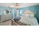 Inviting bedroom with soft lighting and comfortable bedding at 1061 Woodruff St, The Villages, FL 32162