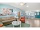 Comfortable living room with tile flooring, ample seating, and great lighting at 1061 Woodruff St, The Villages, FL 32162