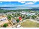 Panoramic aerial view of a neighborhood with a single-story home marked by a red pin at 1109 Hampton St, Clermont, FL 34711