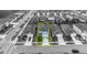 Aerial view of a two-story home in a residential neighborhood with a well-manicured lawn at 113 Camilla Rd, Deland, FL 32724