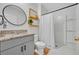 Updated bathroom with granite vanity, modern fixtures, and a clean, bright shower, perfect for relaxation at 113 Camilla Rd, Deland, FL 32724