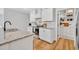 Beautiful kitchen with granite countertops, stainless steel appliances, and a convenient pantry at 113 Camilla Rd, Deland, FL 32724