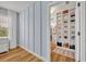 Well-organized walk-in closet with custom shelving and storage solutions, perfect for wardrobe organization at 113 Camilla Rd, Deland, FL 32724