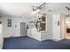 Spacious garage with washer, dryer, utility sink and door to the interior of the home at 1208 Santa Cruz Dr, The Villages, FL 32162