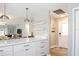 The kitchen has sleek, modern cabinetry and stainless steel hardware at 1208 Santa Cruz Dr, The Villages, FL 32162
