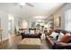 This open living space has a comfortable sitting area at 1208 Santa Cruz Dr, The Villages, FL 32162