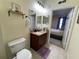 This cozy bathroom has a single vanity and a shower-tub combo at 130 Southern Pecan # 105, Winter Garden, FL 34787