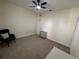 An additional bedroom with carpet and ceiling fan at 130 Southern Pecan # 105, Winter Garden, FL 34787
