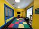 Brightly colored center with play equipment and padded floors, great for activity at 130 Southern Pecan # 105, Winter Garden, FL 34787