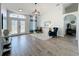 Bright living room with tile floors, stylish furnishings, and abundant natural light at 13013 County Road 561A, Clermont, FL 34715