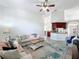 Spacious living room flowing into the kitchen, perfect for entertaining and relaxing at 13013 County Road 561A, Clermont, FL 34715