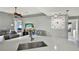 Modern kitchen view features a white countertop and stainless steel sink at 1313 Lake Idamere Blvd, Tavares, FL 32778