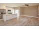 Bright open-concept living space with hardwood floors, a modern kitchen, and ample natural light at 1336 Crystal Lake E Ave, Orlando, FL 32806