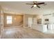 An open concept living area features a modern kitchen and staircase at 1336 Crystal Lake E Ave, Orlando, FL 32806