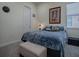 Serene bedroom showcasing a comfortable bed, soft lighting, and a relaxing atmosphere at 1408 Deuce Cir, Davenport, FL 33896