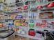 Organized pantry with ample shelving and storage space for kitchen essentials and supplies at 1408 Deuce Cir, Davenport, FL 33896