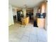 Bright kitchen with tiled floors and backsplash, and stainless steel appliances at 1420 Kissimmee Ct, Kissimmee, FL 34759