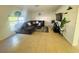 Comfortable living room with tile flooring and a large sectional sofa at 1420 Kissimmee Ct, Kissimmee, FL 34759