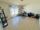 Bright home office with large window and tile flooring at 1420 Kissimmee Ct, Kissimmee, FL 34759