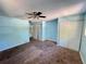 Spacious bedroom with carpet, ceiling fan and ample closet space at 14346 Sw 39Th Ter, Ocala, FL 34473