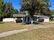A home with a well-maintained front yard and driveway, offering great curb appeal and a welcoming atmosphere at 14346 Sw 39Th Ter, Ocala, FL 34473