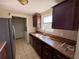 Functional kitchen with wood cabinets, and modern appliances, offering ample storage and food preparation space at 14346 Sw 39Th Ter, Ocala, FL 34473