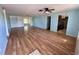 Spacious living room with lots of room featuring hard surface floors, and light blue walls at 14346 Sw 39Th Ter, Ocala, FL 34473