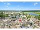 An impressive aerial showcases home with community amenities and a golf course nearby at 1536 Barnwell Pl, The Villages, FL 32162
