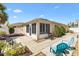 Cozy outdoor patio with seating area, perfect for relaxing or entertaining guests at 1536 Barnwell Pl, The Villages, FL 32162