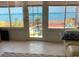 This is a partial image of an enclosed sunroom, and it's not possible to provide a proper description at 1536 Barnwell Pl, The Villages, FL 32162