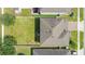 Birds eye view of backyard with green grass and roof with shingles at 161 Williamson Dr, Davenport, FL 33897
