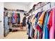 Walk-in closet with ample storage space, including shelving and rods for hanging clothes at 161 Williamson Dr, Davenport, FL 33897