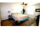 Cozy bedroom with a queen-size bed, soft rug, and ample natural light from the window at 1650 Duran Dr, The Villages, FL 32162