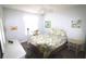 Serene bedroom with a queen-size bed, white furniture, and a ceiling fan at 1650 Duran Dr, The Villages, FL 32162