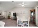 Spacious living area with a dining set at 1733 Oakville Pl, The Villages, FL 32162