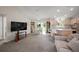 Open-concept living space with a dining area and kitchen at 1733 Oakville Pl, The Villages, FL 32162