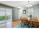 Bright dining room with sliding doors to the patio and ample natural light at 17428 Se 82Nd Albemarle Ave, The Villages, FL 32162