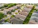 Street view showcasing the well-maintained homes and landscaping in the neighborhood at 17428 Se 82Nd Albemarle Ave, The Villages, FL 32162