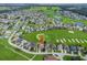 Aerial view of home in golf community with nearby lake at 17769 Se 121St Terrace Rd, Summerfield, FL 34491