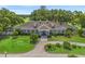 Stunning clubhouse with manicured landscaping and lush green trees, perfect for events and socializing at 17769 Se 121St Terrace Rd, Summerfield, FL 34491