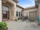 View of front door with outdoor seating at 17769 Se 121St Terrace Rd, Summerfield, FL 34491