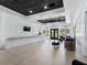 Bright lobby featuring tile floors, a reception desk, modern furniture, and a view of the outdoors at 17769 Se 121St Terrace Rd, Summerfield, FL 34491