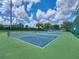 Blue and green tennis courts available for play at 17769 Se 121St Terrace Rd, Summerfield, FL 34491