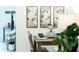 Dining room adjacent to living room and kitchen at 1914 Hux Ct, The Villages, FL 34762