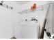 Convenient laundry room equipped with a washer and dryer at 2042 Hydrangea Ave, The Villages, FL 32162