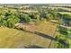 An overhead perspective showing the property's vast land, ideal for farming or development at 23519 State Road 44, Eustis, FL 32736