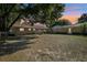 Expansive backyard featuring a large, grassy area perfect for outdoor activities and entertainment at 23519 State Road 44, Eustis, FL 32736