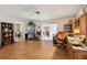 Hardwood floors enhance this spacious living room, offering a seamless flow and ample room for furniture and relaxation at 23519 State Road 44, Eustis, FL 32736