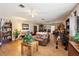 Expansive living room area with hardwood floors, providing ample space for seating arrangements and entertaining at 23519 State Road 44, Eustis, FL 32736
