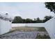 The backyard contains a volleyball net and patio at 2600 Pisces Dr, Orlando, FL 32837